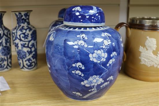 A pair of Chinese blue and white ginger jars and covers and a pair of vases